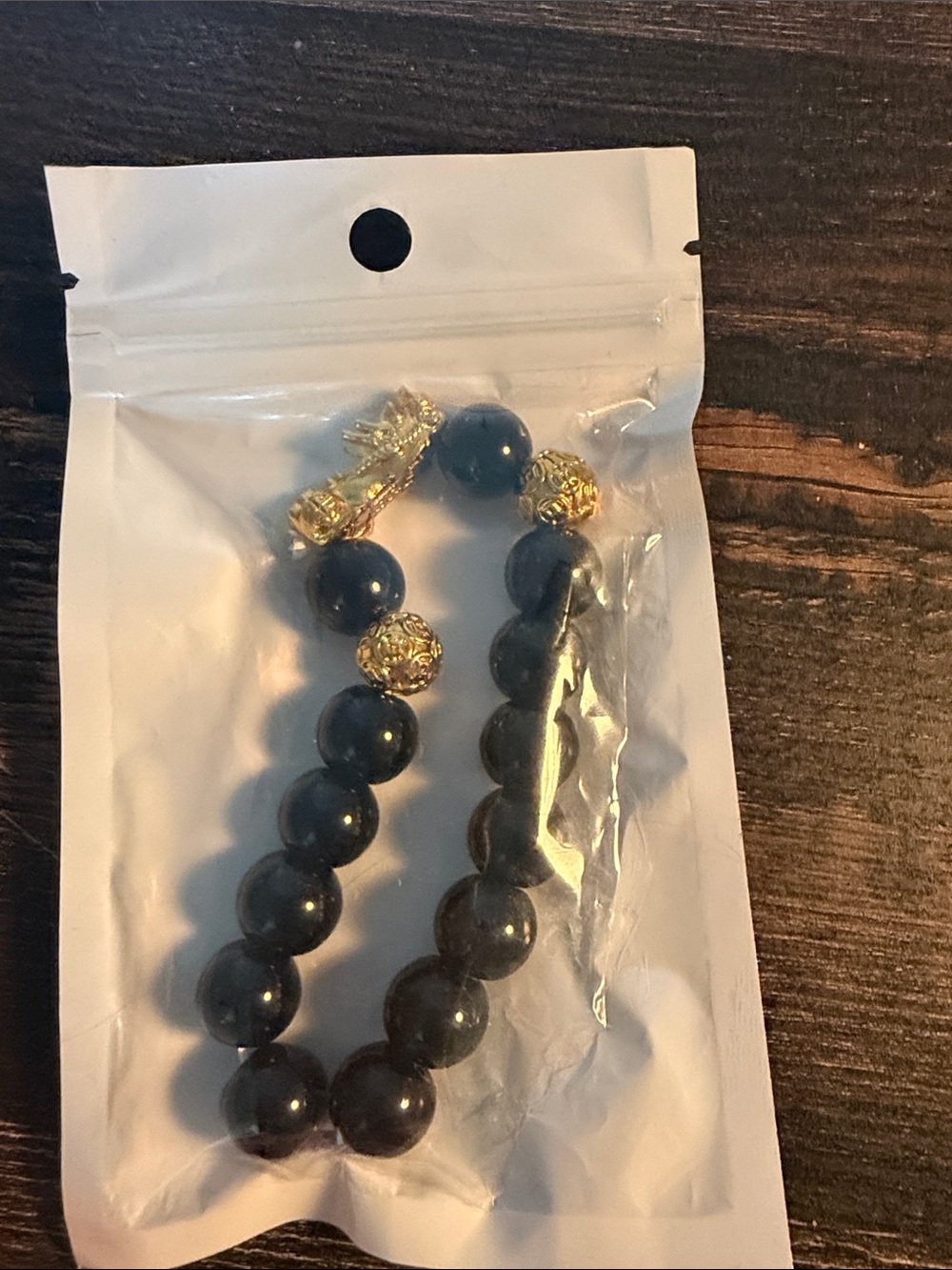 Black Bead Bracelet and one dragon  with Gold Accent Beads
